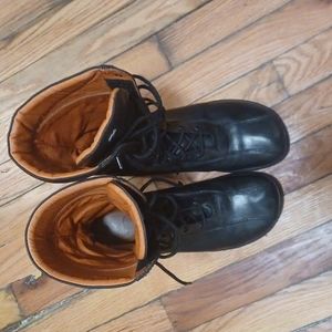 Tall black laceup boots